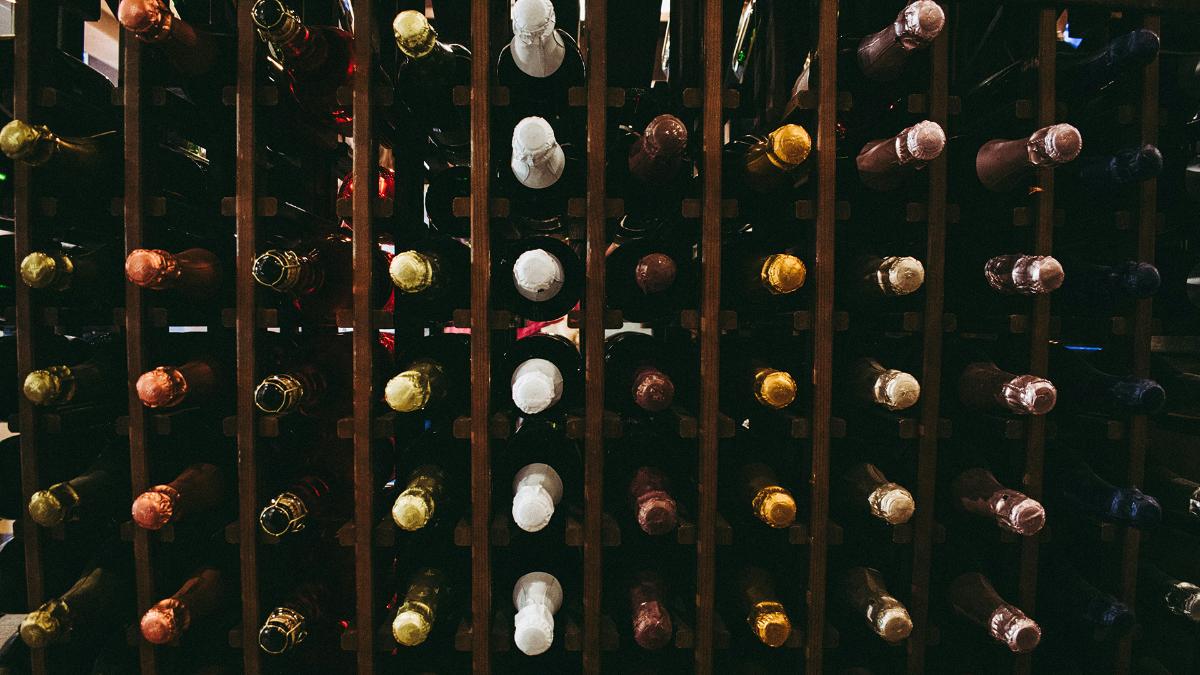 Wine bottles on the shelf.