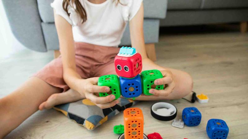 The child is playing with blocks.