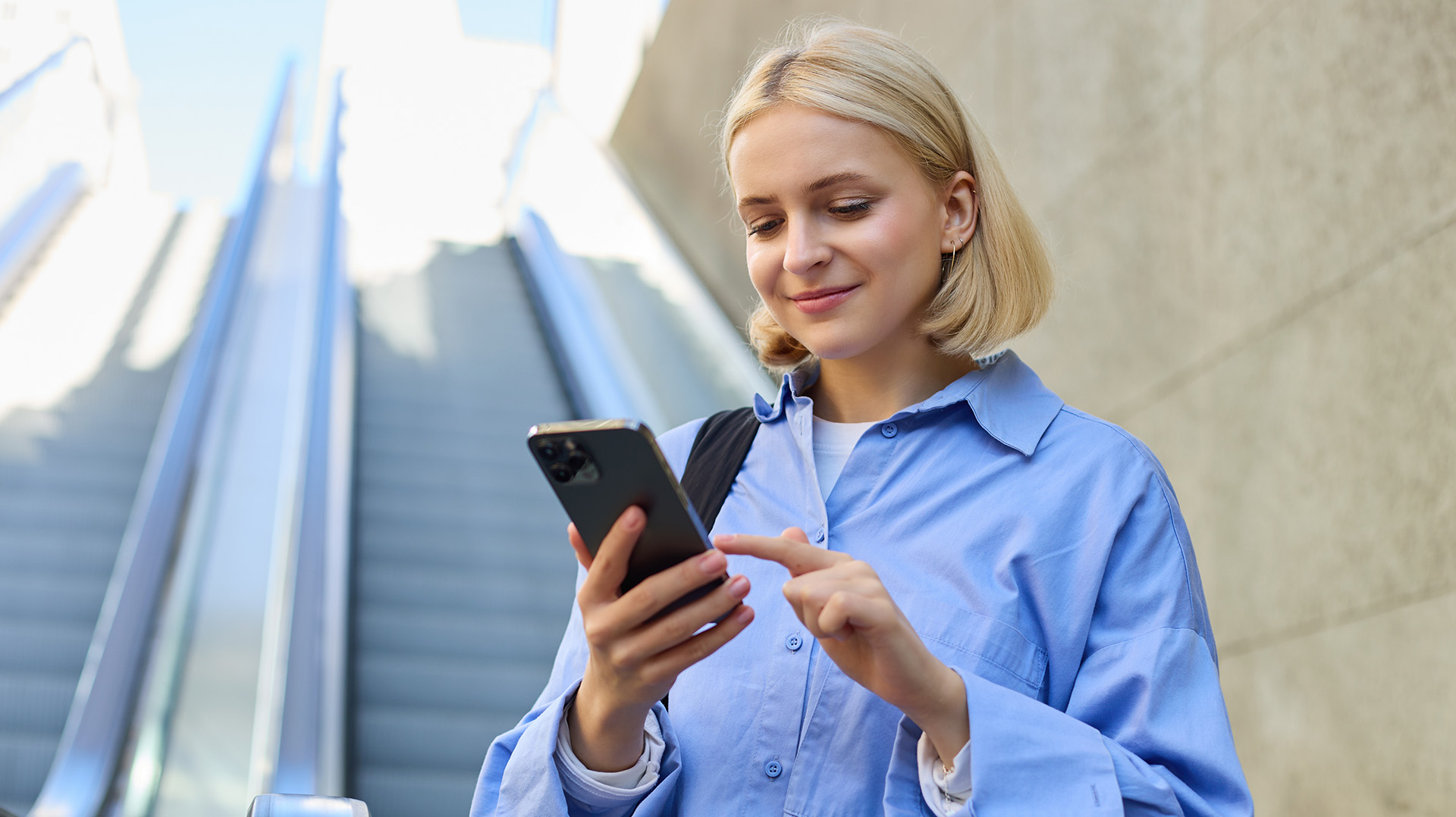Person is using a smartphone.