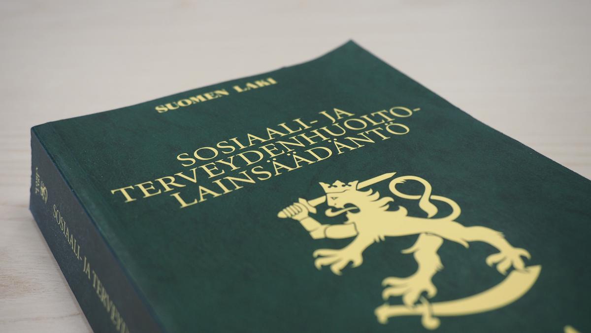 Lakikirjan kansi.